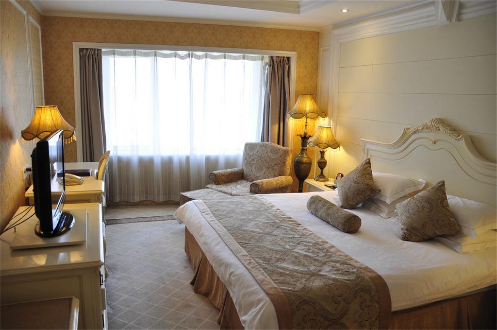 Geneva Hotel Tianjin Habitación foto